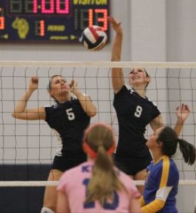 College Park’s Emily Thorson (9) returns a serve during a playoff game Tuesday.