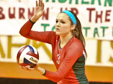 Madison McDaniel serves at the region tournament. The Lady Highlanders are at the state tourney on Friday.