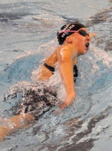 Junior swimmer Kelsey Vetalice set two school records for The John Cooper School last month at Conroe ISD Natatorium.