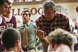 Magnolia West head coach Mike Clifford speaks with his team during a recent game. Magnolia West fell to Caney Creek 46-44 on Dec. 20.