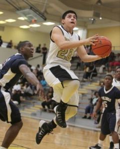 Sophomore guard Victor Bernald and the Conroe Tigers play Magnolia West at 9 a.m. Friday in the opening round of the 49th annual Conroe Christmas Classic.