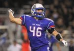 Oak Ridge linebacker Clayton Grett (46) celebrates after defensive linemen Benjamin Acker's second recovered fumble of the game during the fourth quarter of a high school football game Friday. Oak Ridge defeated College Park 21-14. 
