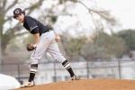 Conroe’s Conner Ontiveros checks a runner during a game against Cypress Falls on Saturday afternoon at Ferrell Park at Elmore Field.