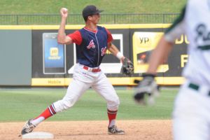 Atascocita's Travis Jones turns a double play against San Antonio Reagan in the Class 5A state semifinals at the Dell Diamond in Round Rock on Friday.