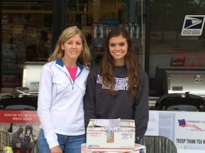 Julie & Gabrielle Pischulla volunteer for Operation Military Embrace. Photo courtesy of Dennis Bernhart.