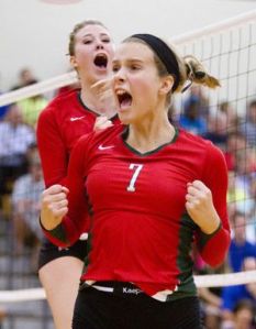 he Woodlands' Hannah Hickman and Rachel Reed celebrate after scoring a point during a high school volleyball game at The Woodlands High School Friday