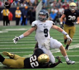 College Park Alumni & Rice's Zach Wright (9) finds the pass agonizingly out of reach while covered by Notre Dame's Elijah Shumate