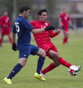 The Woodlands’ Rafael Ortiz dribbles the ball Saturday during a match in the Kilt Cup.