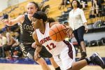 Atascocita's Aimee Brown (12) drives to the basket during Atascocita's 68-29 victory over Conroe on Jan. 20, 2014, at Atascocita High School.