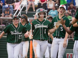 The Woodlands Lady Highlanders cranked out 18 runs in the top of the third inning en route to a 22-0 win over Blair Academy of New Jersey on Thursday morning at Disney.