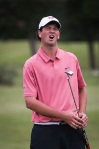 The Woodlands’ Carter Patterson reacts after missing a putt.