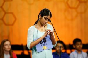Shobha Dasari prepares to spell a word during the 2015 Houston Public Media Spelling Bee