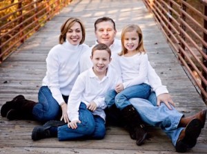 Pictured: Kristi Herring with husband Chris, and children Tristan and Skylar. Photo courtesy of the Herring family.