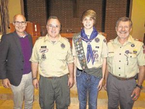 Pictured (from left to right): Pastor Randy Reeves, Scoutmaster Joe Perugini, Eagle Scout James Robinson and Dr. Jon Rawson at Robinson’s Eagle Scout Award celebration.