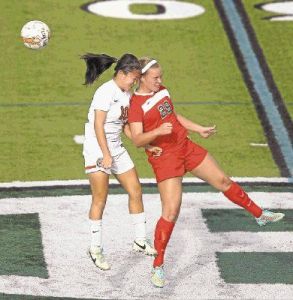 The Woodlands' Grace Piper, right, is the District 16-6A MVP.