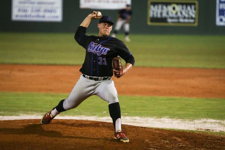 Oak Ridge's Luken Baker throws a pitch against Pflugerville.