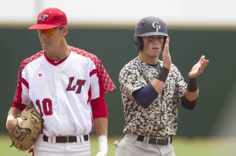 College Park’s Nate Fisbeck cheers as Noah Vaughan takes a third ball in the first inning of a Region II-6A regional quarterfinal game in Mumford Friday.