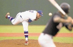 Oak Ridge pitcher Luken Baker throws during a Region II-6A quarterfinal series in Mumford last Friday. Oak Ridge defeated Bowie 2-0 to advance to the regional semifinals and will play Rockwall in the Regional Semifinals.