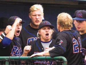 Oak Ridge’s Anthony Smith (21) celebrates with teammates after his RBI single in a Region II-6A regional semifinal series in Mumford Saturday.