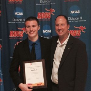 Brian Baehl (left) and Austin College head coach Rodney Wecker (right) pose for a photo after Baehl received the Pat E. Hooks Award for for most outstanding men’s basketball player