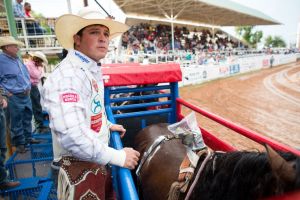Bareback rider Richmond Champion of The Woodlands waits to compete Wednesday during the first performance of the West of the Pecos Rodeo at Buck Jackson Arena in Pecos.