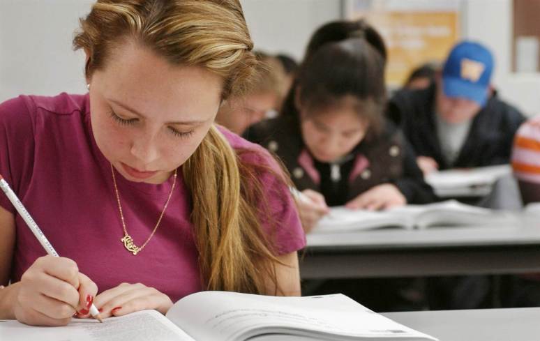 A student works on a sample SAT during her Kaplan SAT Course in Newton, Massachusetts.