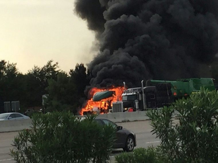 Witnesses reported to fire officials there were two explosions, first from the truck’s diesel tank and then from inside the truck’s cab at Interstate 45 just north of Texas 242 on Tuesday.