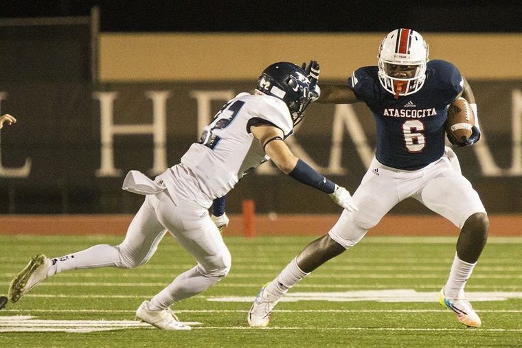 Atascocita running back Patrick Taylor Jr. runs during a game last season for the Eagles. Taylor currently has eight offers to play college football.