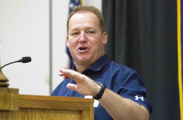 College Park head coach Richard Carson speaks during the annual Pigskin Preview at the Noon Lions Club meeting Wednesday.