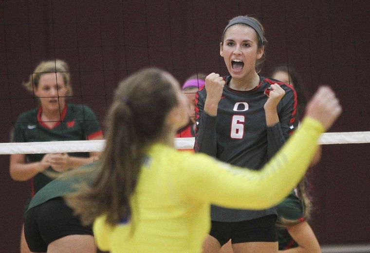 Oak Ridge's Molly Russell celebrates a point during a high school volleyball game at the Magnolia Volley Battle Tournament Friday.