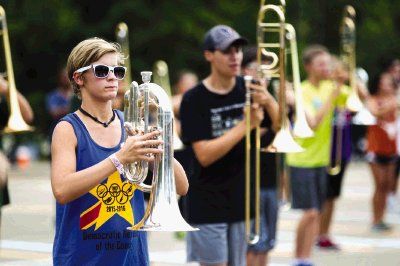 College Park band students practice in the school’s parking lot after school. The band has been working since early August on drill, form and memorizing music to prepare for the 2015 competition season.