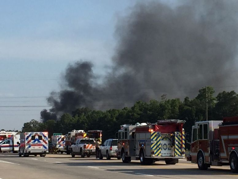 Black plumes of smoke are scene from a chemical plant fire Friday, Aug. 14, 2015 at the DrillChem plant in the 4100 block of South Loop 336 in Conroe.