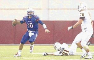 Oak Ridge quarterback Braden Letney looks for a receiver against Deer Park last season. The War Eagles will face Deer Park on the road Friday night.