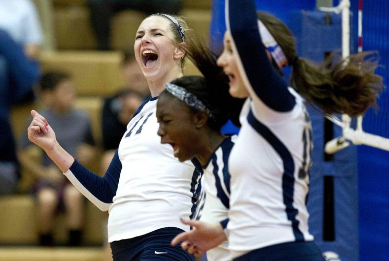 College Park celebrates after winning the first set during a volleyball game against Oak Ridge Tuesday. 
