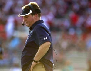 A dejected College Park coach Richard Carson is pictured during his team’s 36-7 loss to Atascocita. The Cavaliers dropped at 1-4 with the loss.