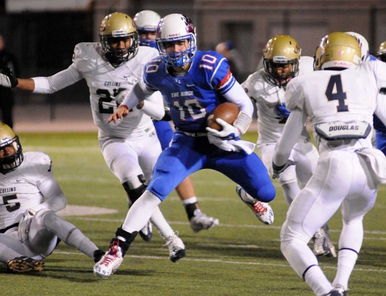 Oak Ridge running back Braden Letney runs for yardage during the Klein Collins vs. Oak Ridge football at Woodforest Bank Stadium in Shenandoah.