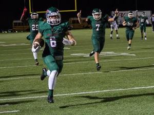TWHS Highlander Connor Binney with his interception for a touchdown.