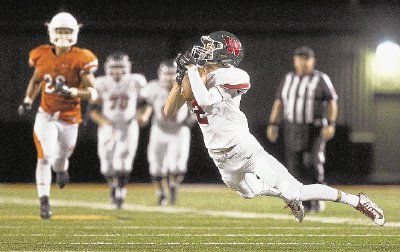 Senior wideout Hunter Moore and The Woodlands look to remain unbeaten in District 16-6A play tonight against Oak Ridge at Woodforest Bank Stadium.