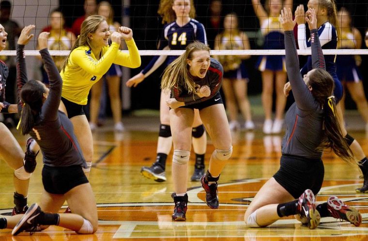 Oak Ridge celebrates after defeating Dallas Highland Park 3-1 during a Region II-6A regional semifinal match Fridayin Huntsville.