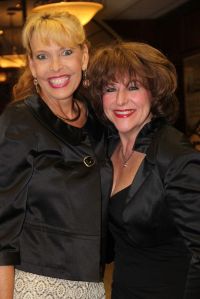 Class Act Musical Proves More To Scrooge Than Victorian Angst: Renell Petigo, pre-event chairlady, left, and B J Ordner ,president of the Montgomery County Performing Arts Society, welcomed patrons to a celebration at Woodforest National Bank in Conroe prior to Steve Lippia’s “The Ultimate Sinatra” tribute Nov. 7 in the Crighton Theatre.