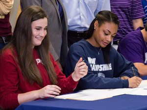 Hannah Erwin and Kennedi Smith sign their letters of intent at College Park's Signing Day Ceremony.