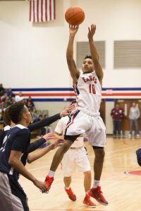 Atascocita's Greg Shead (10) shoots a fadeaway during Atascocita's 82-56 victory over College Park on Jan. 2, 2014, at Atascocita High School.