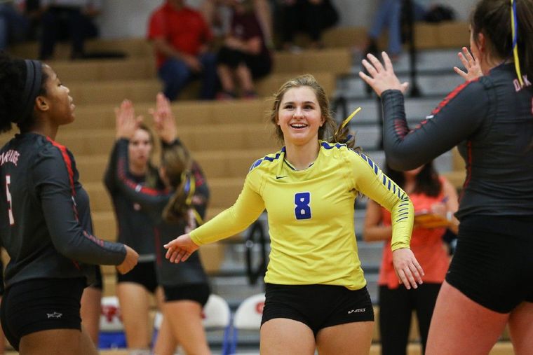 Oak Ridge's Raigen Cianciulli (8) celebrates with teammates during the high school volleyball game against Klein in November at Oak Ridge High School.
