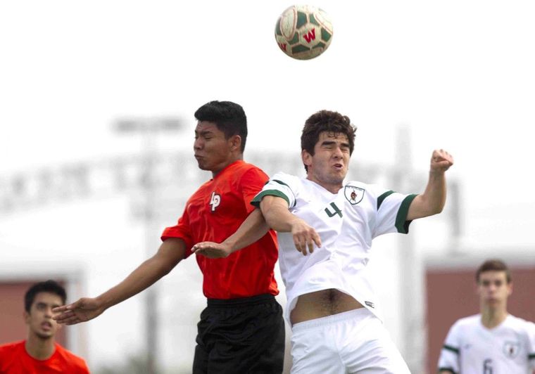 The Woodlands’ Rodrigo Burgete goes up for a header during the Kilt Cup soccer tournament Thursday.